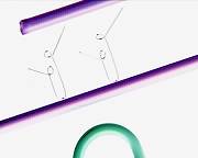 Tiny silver paperclips between the arms of a giant green one.