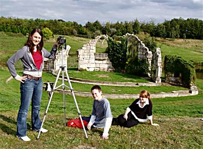 Photo of the Andrews sisters and friend on location.