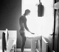 Kevin at the bathroom basin.