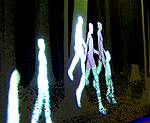 Painted figures walking.