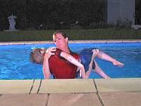Bringing the body out of the pool.